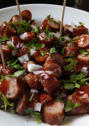 A picture of #My kids Favourite dish contest Sausage biting.