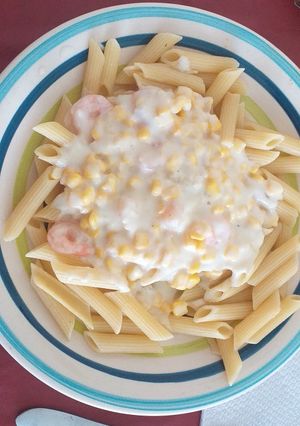 Una foto de Pastas con salsa Blanca camarón choclo