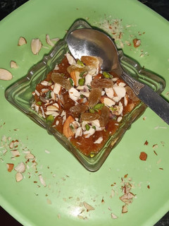 A picture of Suji halwa milk dip.