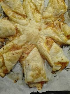 Una foto de Pizza con forma de estrella