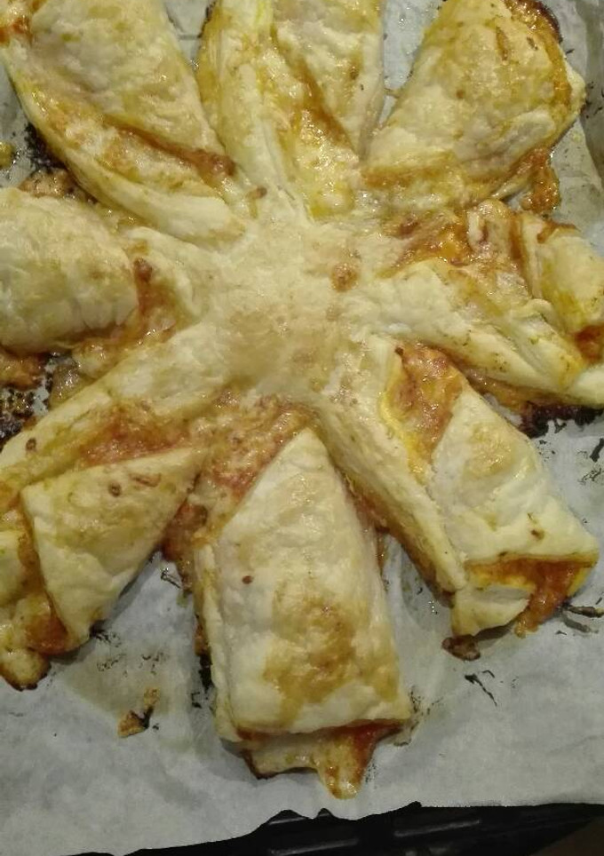 Una foto de Pizza con forma de estrella