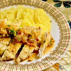 A picture of Juicy chicken breast with mushroom butter sauce and mashed potatoes.