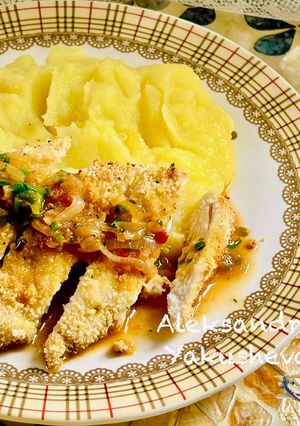 A picture of Juicy chicken breast with mushroom butter sauce and mashed potatoes.