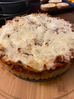 A picture of Rigatoni pasta pie.