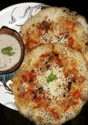 A picture of Onion tomato Uttapa.