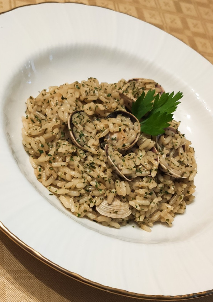 Una foto de Arroz con almejas