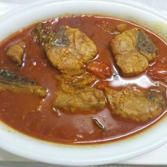 Fish curry A picture of Fish curry.