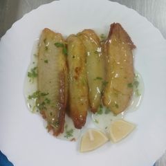 A picture of Baked fish fillet in lemon butter sauce. #AuthorMarathon.