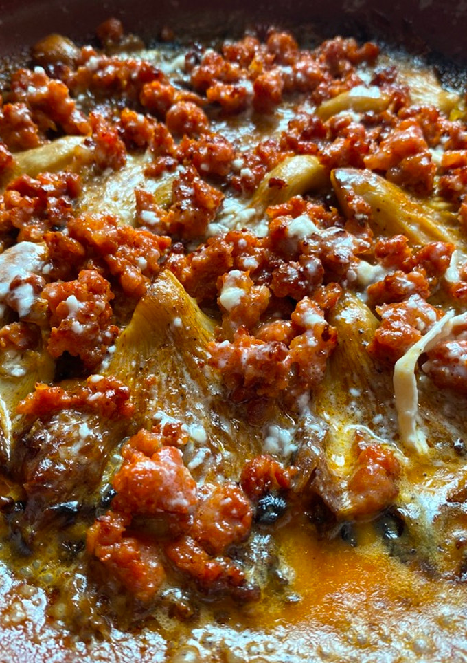 Una foto de Setas con picadillo de chorizo y queso de cabra