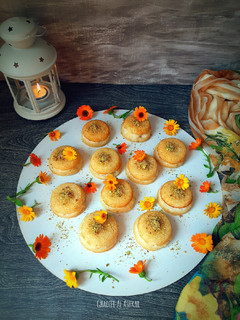 صورة لوصفة ميني بسبوسة بالقشطة بقوالب ال cupcake 🧡