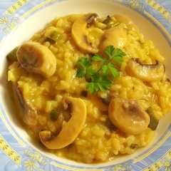 Una foto de Risotto de champiñones y calabacín