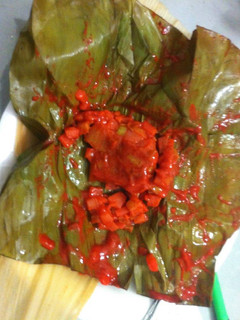 Una foto de Pescado de cuaresma al pibil en hoja de plátano tipo Doña Licha