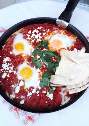 Una foto de Shakshuka picante