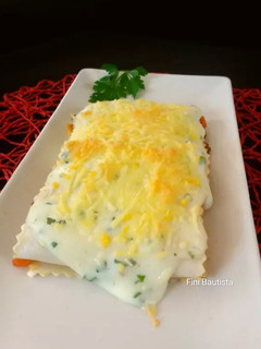 Una foto de Canelones a la boloñesa
