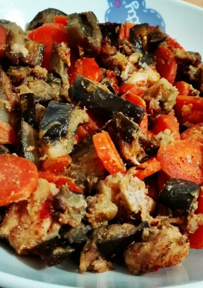 Una foto de Zanahorias con berenjenas y gambas