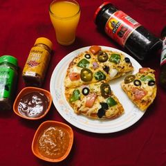 Veg cheese pizza A picture of Veg cheese pizza.