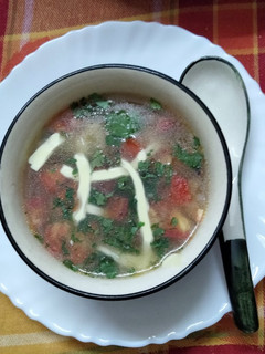 A picture of Clear soup with winter vegetables.
