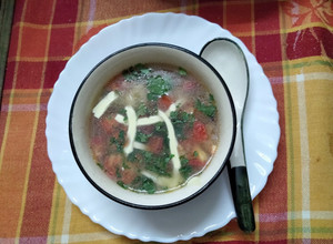 A picture of Clear soup with winter vegetables.