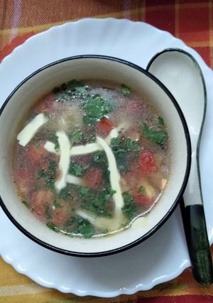A picture of Clear soup with winter vegetables.