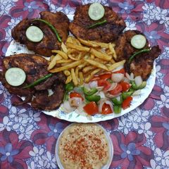 A picture of Chicken steak with tandoori sauce.