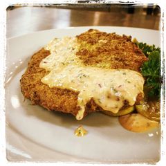 A picture of Cornmeal Panko Crusted Catfish with a Sriracha Remoulade.