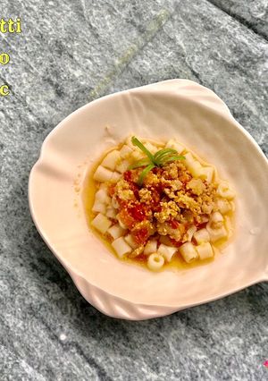Hình của món Nui Spaghetti thịt heo rắc phomai.