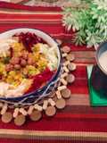 Vegetable Poha with the goodness of beetroot and cucumber served with almond milk