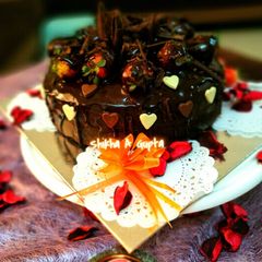 A picture of Eggless dripping chocolate cake.