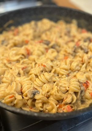 A picture of Creamy mushroom pasta with goat cheese.
