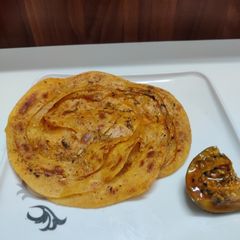 A picture of Masaledar lacha paratha.