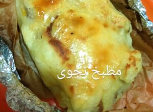 صورة لوصفة بطاطا كومبير تركية (بطاطا مشوية ومحشية)