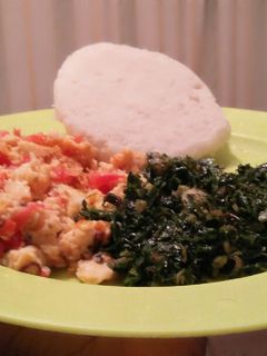 A picture of Wet fried eggs, ugali and spinach.