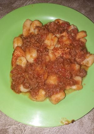 Una foto de Ñoquis de leche con salsa