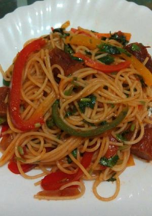 A picture of Spaghetti with sausages.