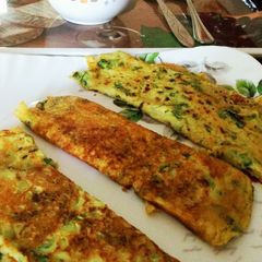 Oats spring Onion dosa A picture of Oats spring Onion dosa.