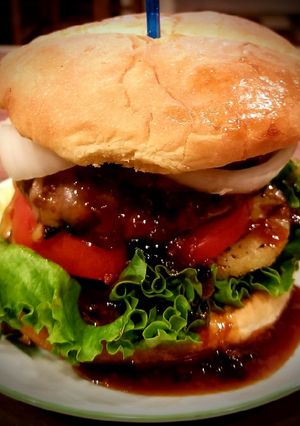 A picture of Mike's Double Decker Sweet Hawaiian Swiss Burgers.