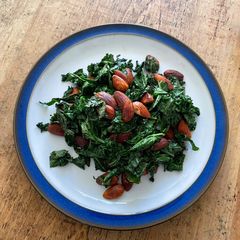Pan fried kale with toasted almonds A picture of Pan fried kale with toasted almonds.