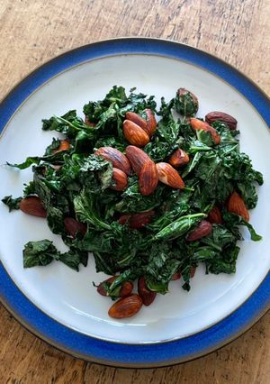 A picture of Pan fried kale with toasted almonds.