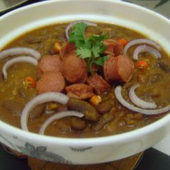 A picture of Rajma Masala with Sausages.