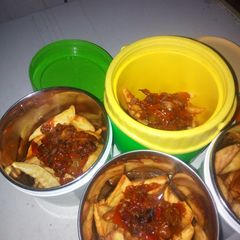 A picture of Fried sweet potatoes and tomatoes sauce.