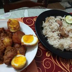 Chicken Dakbunglow served with Gondhoraj fish pulao A picture of Chicken Dakbunglow served with Gondhoraj fish pulao.