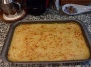 Una foto de lasagna con puerro