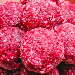 A picture of Beetroot Coconut Ladoo.