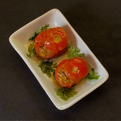 A picture of Mediterranean style Baked Stuffed Tomato.