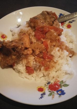 A picture of Stewed beef with rice.