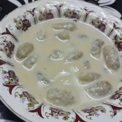 A picture of Choshi Pithe(with sooji and nariyal).