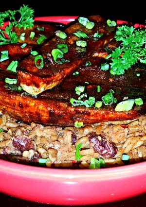 A picture of Mike's Sinfully Sweet & Spicy Plantains Over Red Beans & Rice.