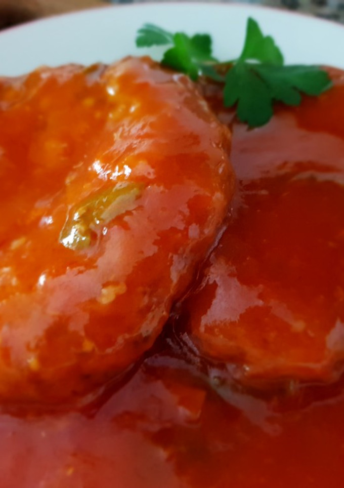 Una foto de Burguer mixta entomatada