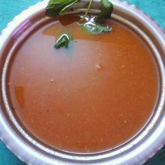A picture of Drumstick and tomato soup.