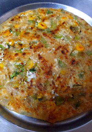 A picture of Paneer cheese corn paratha.